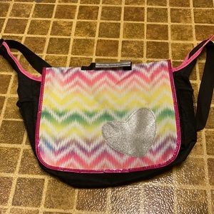 Children's crossbody bag with handle and adjustable strap
